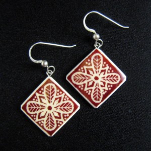 red feather cross earrings